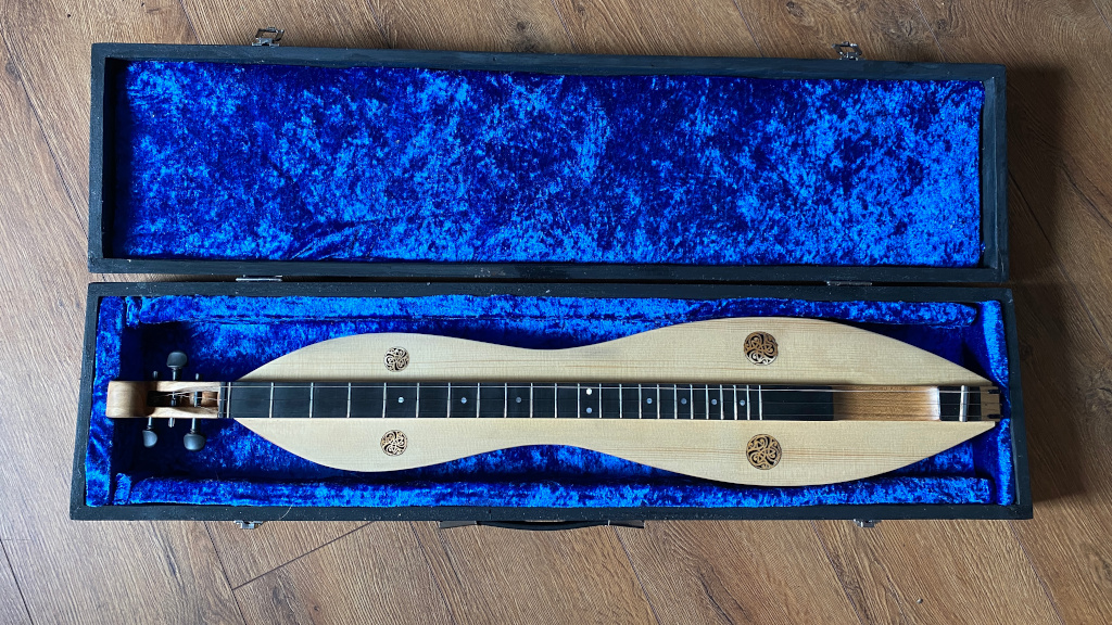 Dulcimer in its case, birds eye view