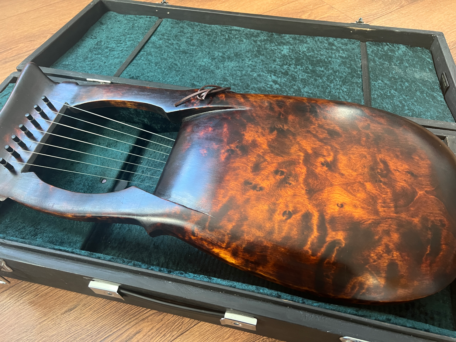 back view of lyre in case