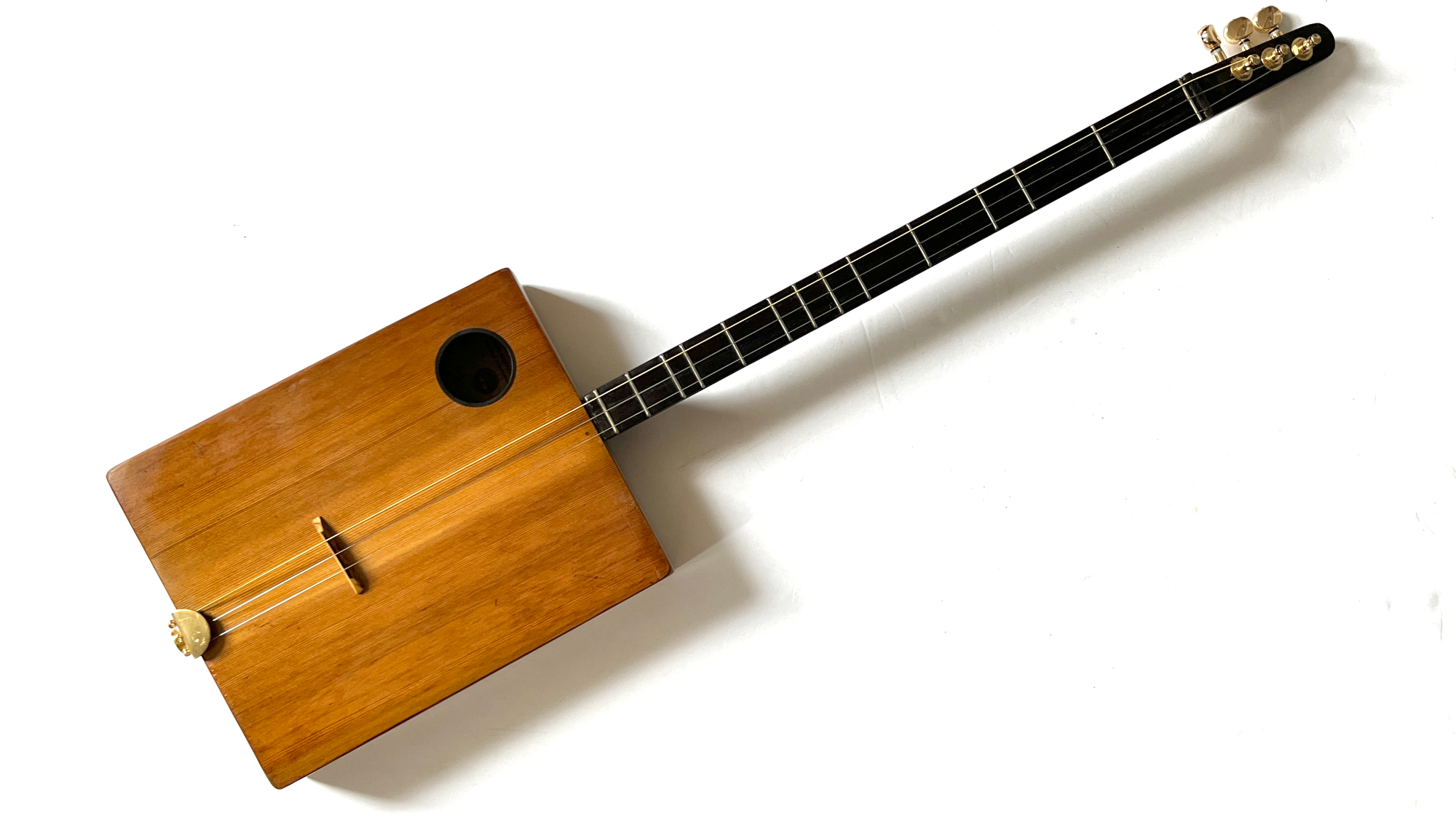 cigar-box-stick-dulcimer. made of red cedar and tulip wood