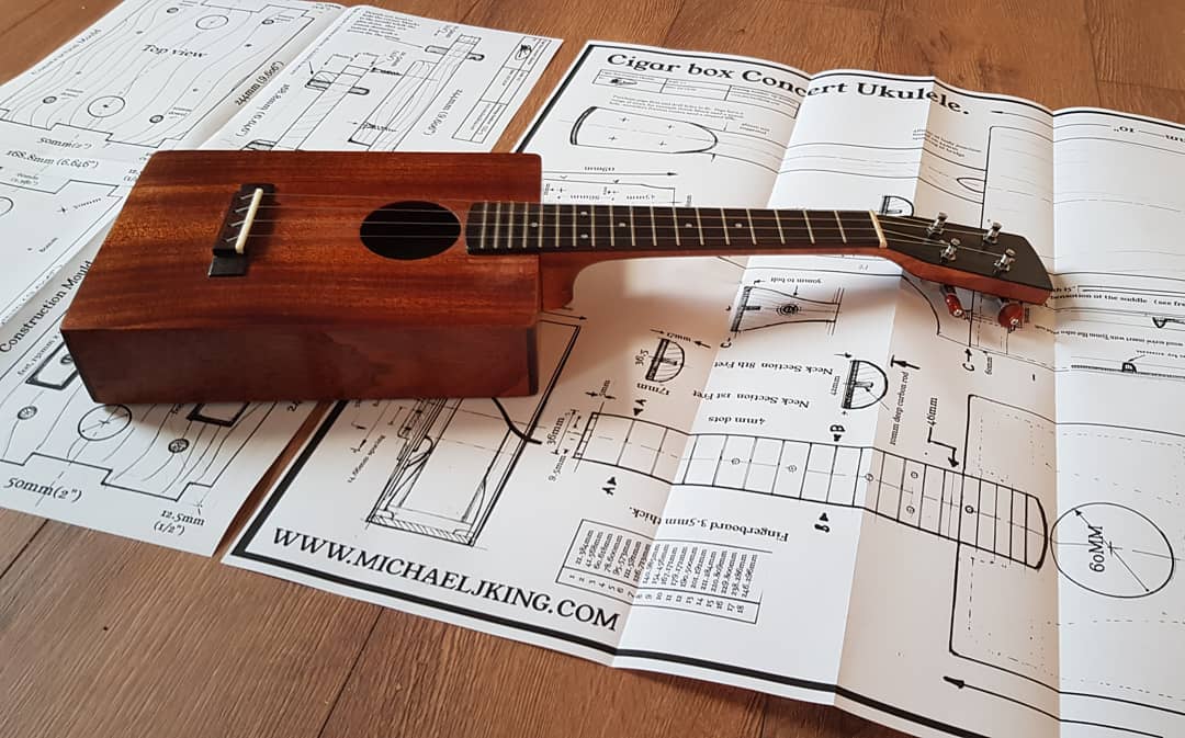 Ukulele example on a printed set of plans 