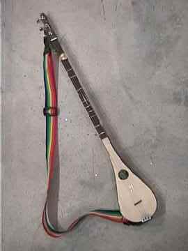 old 2003 Stick dulcimer and rainbow strap